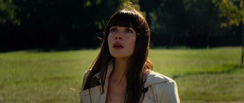 Movie still from “The Incredible Hulk” (2008), directed by Louis Leterrier – A beautiful woman with long brown hair looking up; Close Up shot, Low angle