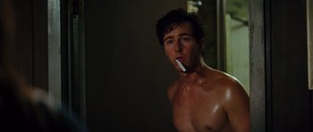 Movie still from “The Incredible Hulk” (2008), directed by Louis Leterrier – A shirtless man brushing his teeth in a bathroom; Close Up shot, Low angle