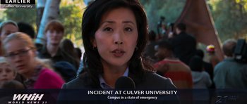 Movie still from “The Incredible Hulk” (2008), directed by Louis Leterrier – An asian woman is speaking into a microphone; Extreme Wide shot, High angle