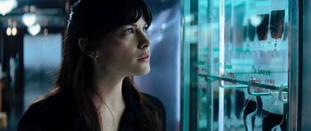 Movie still from “The Incredible Hulk” (2008), directed by Louis Leterrier – A woman looking out of a window at night; Close Up shot, Over the shoulder angle