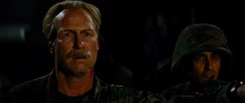 Movie still from “The Incredible Hulk” (2008), directed by Louis Leterrier – A person wearing a camouflage uniform; Close Up shot, Low angle