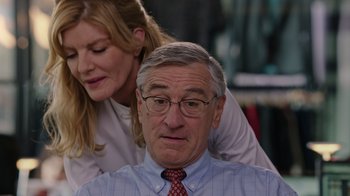 Movie still from “The Intern” (2015), directed by Nancy Meyers – An older man and a younger woman looking at each other; Medium shot, Over the shoulder angle