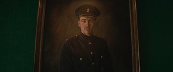 Movie still from “The King's Man” (2021), directed by Matthew Vaughn – A painting of a man wearing a uniform; Close Up shot, Low angle