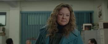 Movie still from “The Kitchen” (2019), directed by Andrea Berloff – A person with long hair; Close Up shot, Over the shoulder angle