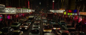Movie still from “The Kitchen” (2019), directed by Andrea Berloff – A bunch of cars that are in the street; Extreme Wide shot, High angle