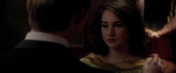 Movie still from “The Last Letter from Your Lover” (2021), directed by Augustine Frizzell – A man and a woman are looking at one another; Close Up shot, Over the shoulder angle