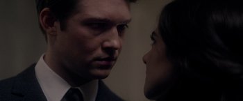 Movie still from “The Last Letter from Your Lover” (2021), directed by Augustine Frizzell – A man and a woman face to face; Extreme Close Up shot, Over the shoulder angle