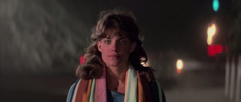 Movie still from “The Last Starfighter” (1984), directed by Nick Castle – A person wearing a scarf; Close Up shot, Low angle