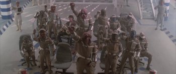 Movie still from “The Last Starfighter” (1984), directed by Nick Castle – A group of people dressed in star wars costumes; Wide shot, High angle