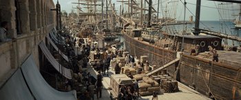 Movie still from “The Last Voyage of the Demeter” (2023), directed by André Øvredal – Many people on the docks of the boats; Extreme Wide shot, High angle