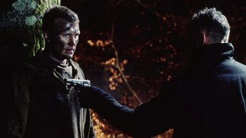 Movie still from “Dog Soldiers” (2002), directed by Neil Marshall – Medium shot, Over the shoulder angle