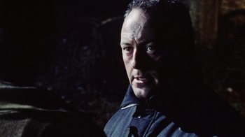 Movie still from “Dog Soldiers” (2002), directed by Neil Marshall – Close Up shot, Over the shoulder angle