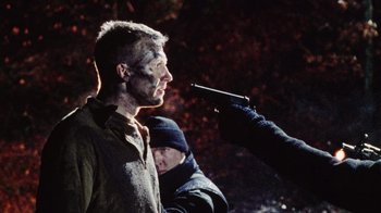 Movie still from “Dog Soldiers” (2002), directed by Neil Marshall – Close Up shot, Over the shoulder angle