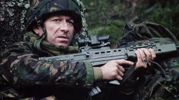 Movie still from “Dog Soldiers” (2002), directed by Neil Marshall – Medium shot, Low angle