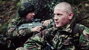 Movie still from “Dog Soldiers” (2002), directed by Neil Marshall – Medium shot, Over the shoulder angle