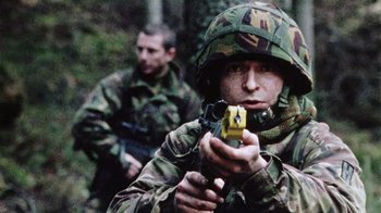 Movie still from “Dog Soldiers” (2002), directed by Neil Marshall – Medium shot, Low angle