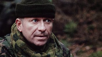 Movie still from “Dog Soldiers” (2002), directed by Neil Marshall – Close Up shot, Over the shoulder angle