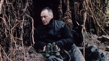 Movie still from “Dog Soldiers” (2002), directed by Neil Marshall – Medium shot, High angle