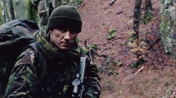 Movie still from “Dog Soldiers” (2002), directed by Neil Marshall – Medium shot, Low angle