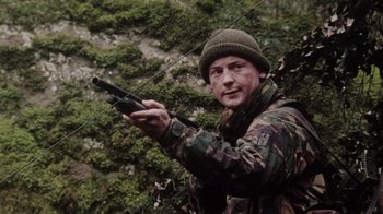 Movie still from “Dog Soldiers” (2002), directed by Neil Marshall – Medium shot, High angle