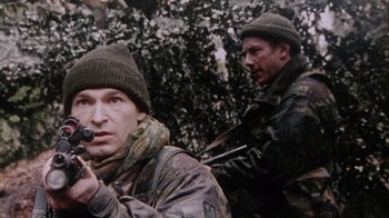 Movie still from “Dog Soldiers” (2002), directed by Neil Marshall – Medium shot, Over the shoulder angle