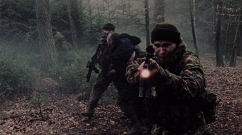 Movie still from “Dog Soldiers” (2002), directed by Neil Marshall – Medium shot, Low angle