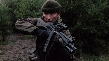 Movie still from “Dog Soldiers” (2002), directed by Neil Marshall – Medium shot, Low angle