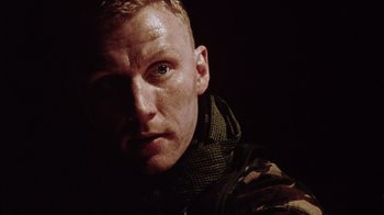 Movie still from “Dog Soldiers” (2002), directed by Neil Marshall – Close Up shot, Low angle