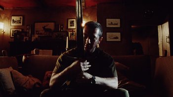 Movie still from “Dog Soldiers” (2002), directed by Neil Marshall – Medium shot, Low angle