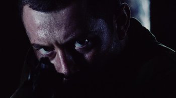 Movie still from “Dog Soldiers” (2002), directed by Neil Marshall – Extreme Close Up shot, Low angle