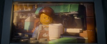 Movie still from “The Lego Movie” (2014), directed by Phil Lord – A lego man holding a cup; Extreme Close Up shot, Over the shoulder angle