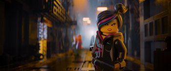 Movie still from “The Lego Movie” (2014), directed by Phil Lord – A lego character is standing in a city street; Close Up shot, Over the shoulder angle