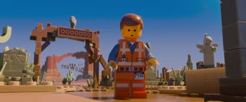 Movie still from “The Lego Movie” (2014), directed by Phil Lord – A lego man standing in front of a construction site; Medium shot, Over the shoulder angle