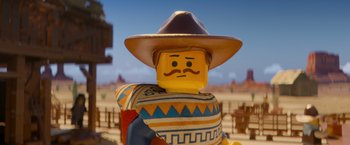 Movie still from “The Lego Movie” (2014), directed by Phil Lord – A lego man wearing a cowboy hat and a sweater; Close Up shot, Over the shoulder angle