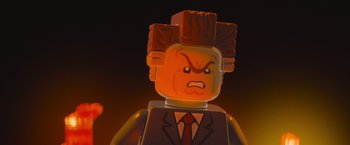 Movie still from “The Lego Movie” (2014), directed by Phil Lord – The head of a lego character; Close Up shot, Over the shoulder angle