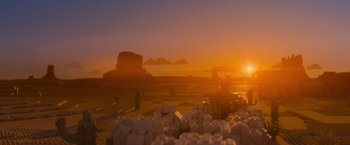 Movie still from “The Lego Movie” (2014), directed by Phil Lord – The sun is setting over a desert landscape; Extreme Wide shot, Over the shoulder angle