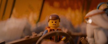 Movie still from “The Lego Movie” (2014), directed by Phil Lord – The head of a lego character; Close Up shot, Over the shoulder angle