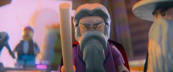 Movie still from “The Lego Movie” (2014), directed by Phil Lord – The head of a lego character; Close Up shot, Over the shoulder angle