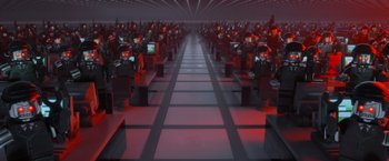 Movie still from “The Lego Movie” (2014), directed by Phil Lord – A room filled with lots of computer monitors and chairs; Extreme Wide shot, High angle