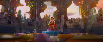 Movie still from “The Lego Movie” (2014), directed by Phil Lord – An image of a lego man in the background; Wide shot, Over the shoulder angle