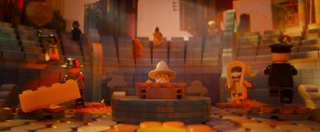 Movie still from “The Lego Movie” (2014), directed by Phil Lord – A lego man sitting on a bench; Extreme Close Up shot, High angle