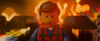 Movie still from “The Lego Movie” (2014), directed by Phil Lord – The head of a lego man; Extreme Close Up shot, Overhead angle