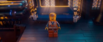 Movie still from “The Lego Movie” (2014), directed by Phil Lord – A lego man sitting on the floor; Medium shot, Over the shoulder angle