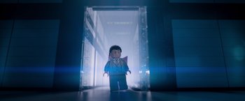 Movie still from “The Lego Movie” (2014), directed by Phil Lord – A lego man standing in front of an open door; Medium shot, Low angle