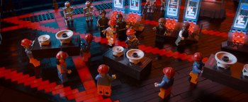Movie still from “The Lego Movie” (2014), directed by Phil Lord – A group of people that are standing around; Extreme Wide shot, High angle
