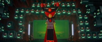 Movie still from “The Lego Movie” (2014), directed by Phil Lord – A lego figure is standing in front of a green screen; Medium shot, Low angle