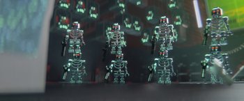 Movie still from “The Lego Movie” (2014), directed by Phil Lord – A group of toy skeletons with guns in their hands; Extreme Wide shot, Low angle