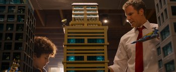 Movie still from “The Lego Movie” (2014), directed by Phil Lord – A tall building made out of lego blocks; Close Up shot, Low angle