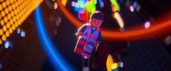 Movie still from “The Lego Movie” (2014), directed by Phil Lord – A lego man is holding a piece of luggage; Close Up shot, Low angle