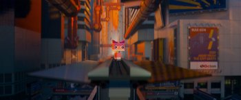 Movie still from “The Lego Movie” (2014), directed by Phil Lord – A toy cat sitting on top of a train track; Wide shot, Low angle